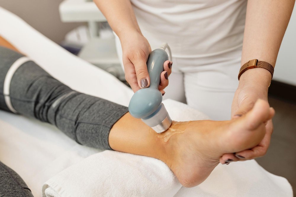 Dr Shyam Thakkar examining a patient's foot and ankle at ARTICUL8 Foot and Ankle Clinic, Pune